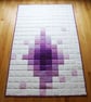 Plum Starburst Quilt - Image 1