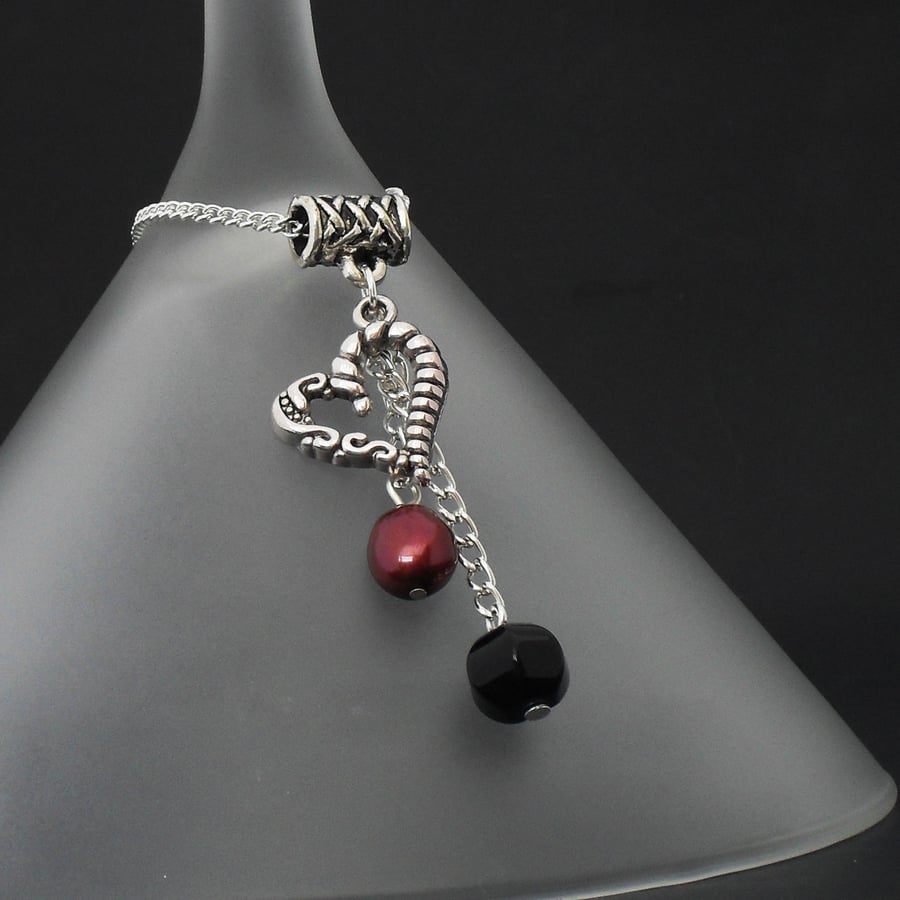 Black onyx and red pearl heart charm necklace