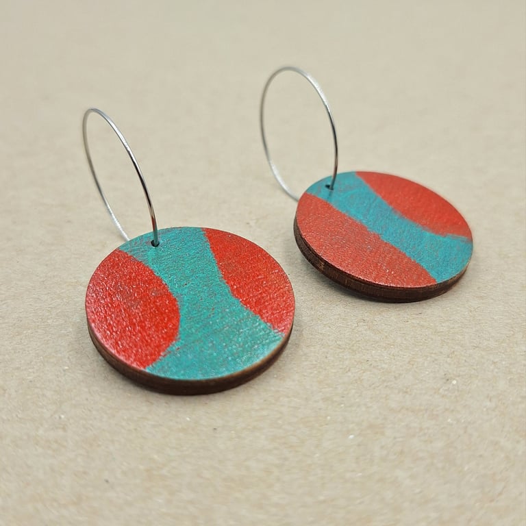 Red and green small wooden disc abstract earrings on stainless steel hoops