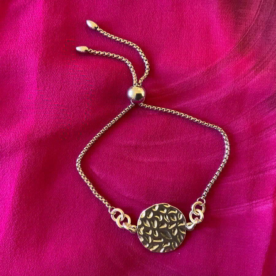 Slider Bracelert With Metal Disc.