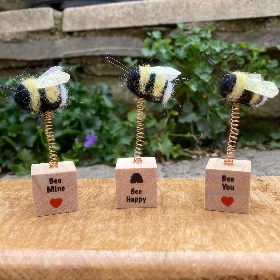 Needle felted bee mounted on wood block with various sentiments