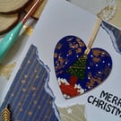 Christmas card with a wooden Christmas treedecoration