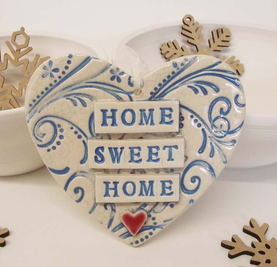 Blue ceramic heart decoration Home Sweet Home.