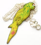 pendant - parrot: scrolled dark red, green, red over yellow - Image 1