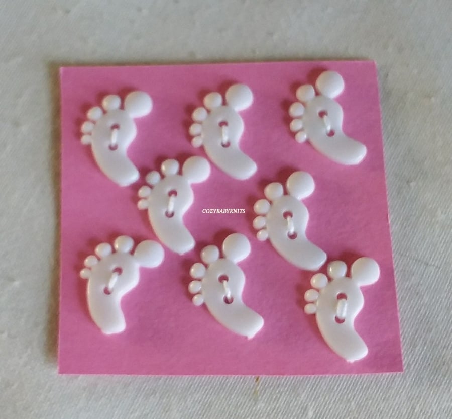 WHITE FEET SHAPED BUTTONS WITH TWO HOLES FOR ATTACHING 
