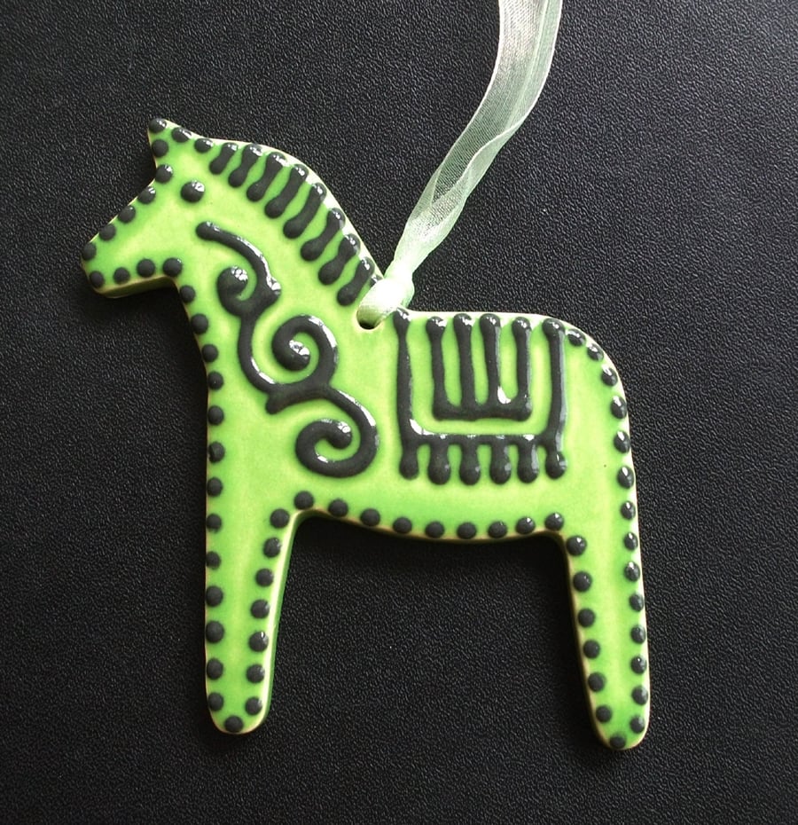 Green ceramic folk horse decoration