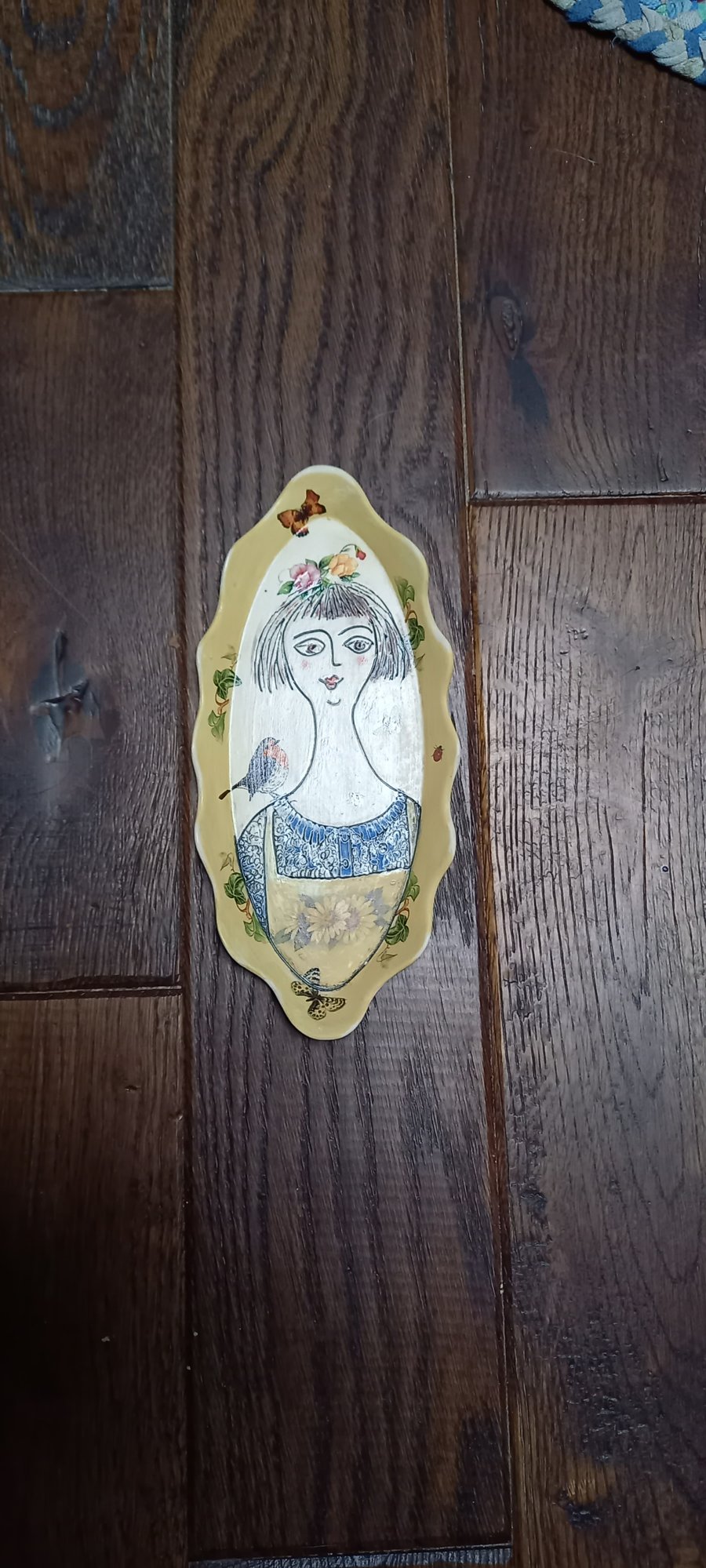 Figurative wall hanging .