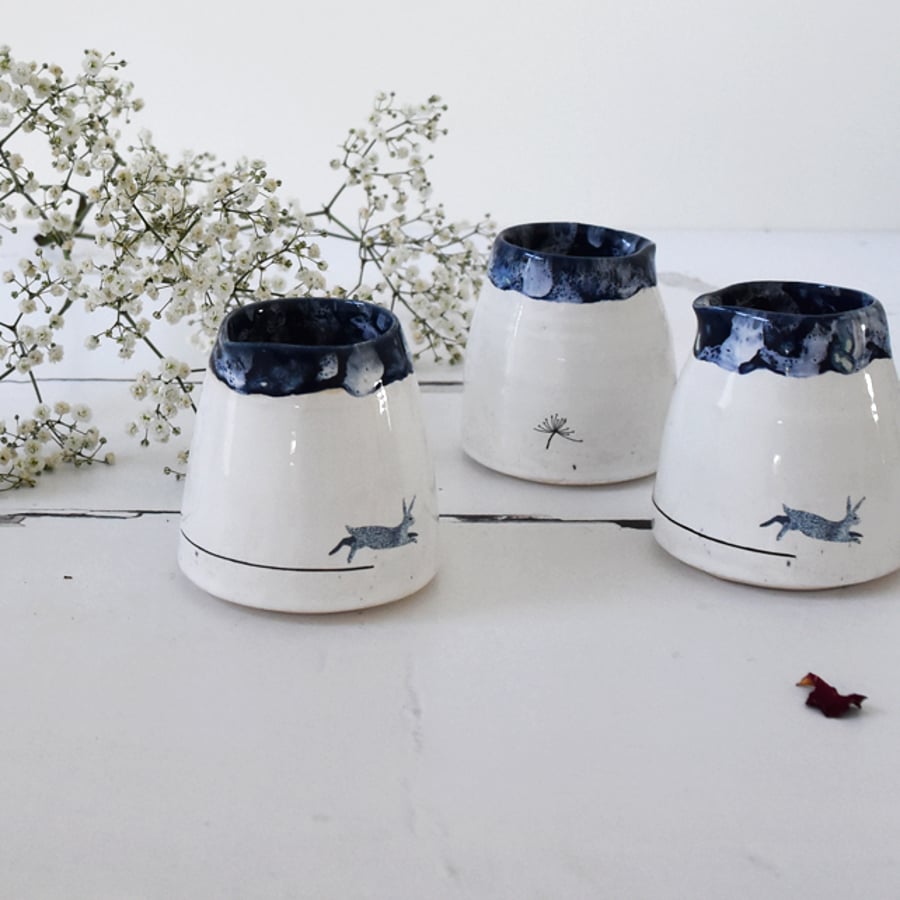 Small handmade blue and white ceramic milk creamer pourer with hare image 