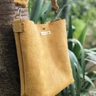 Embossed leather bucket bag