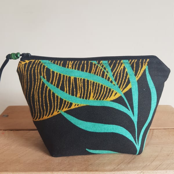 Zipped pouch: contemporary leaf design on black