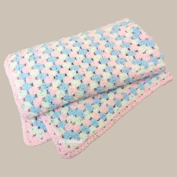 Crochet blanket in blue and pink, granny square pattern, square crochet blanket