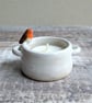 Small ceramic tealight holder with mini robin, white glaze