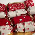 Set of 4 Reusable Christmas Crackers in red and cream Scandi fabrics