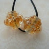 handmade gold glitter lampwork glass bead pair