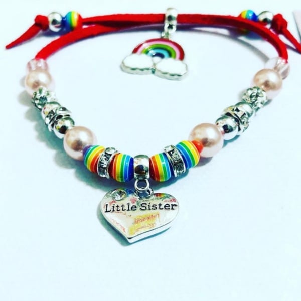 Little sister red suede effect corded bracelet with rainbow charm bracelet 