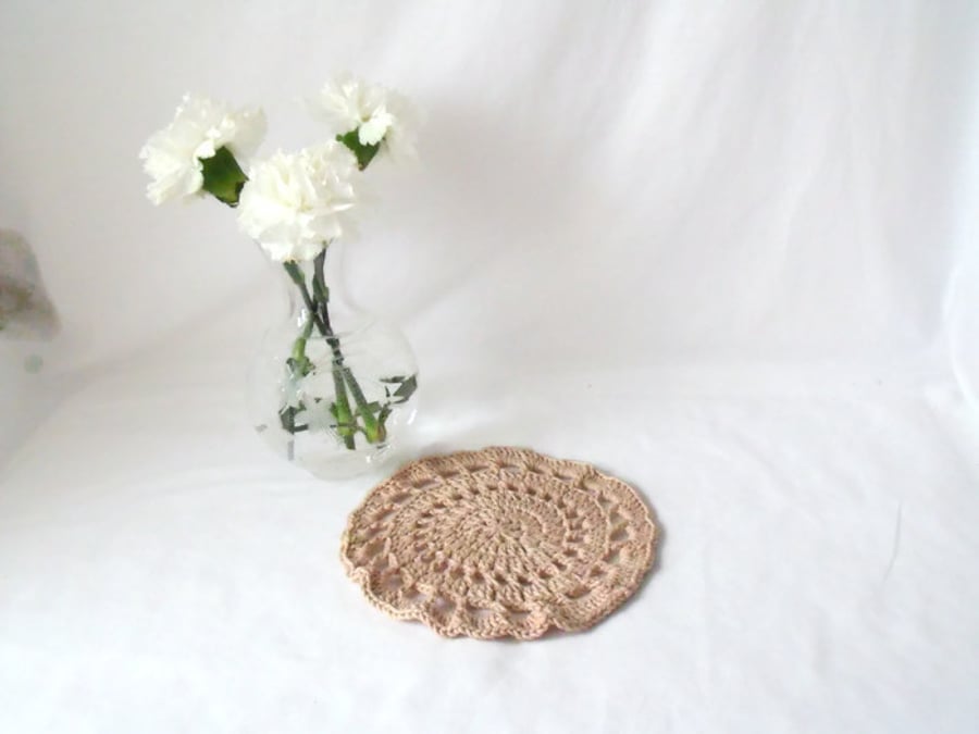 beige cotton crocheted doily, crochet candle mat or lamp stand.