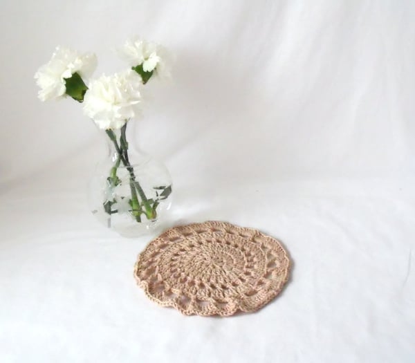 beige cotton crocheted doily, crochet candle mat or lamp stand.