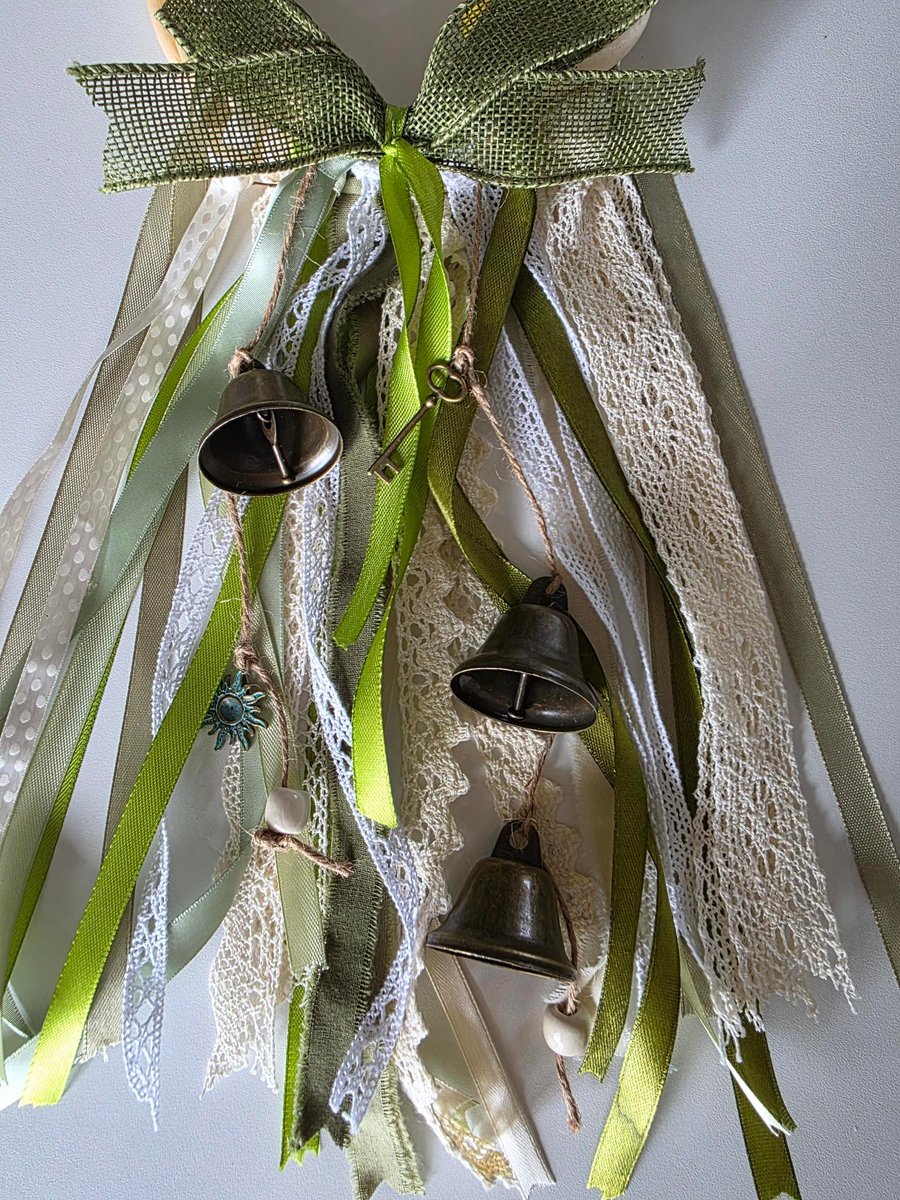 Beautiful WitchBells, hanging from a 6" circle of woven willow 