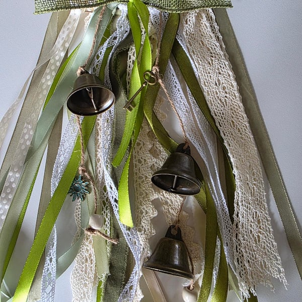 Beautiful WitchBells, hanging from a 6" circle of woven willow 