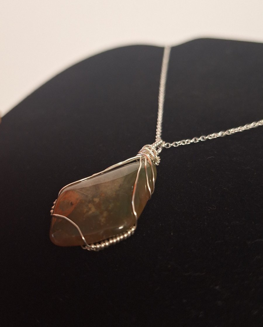 A completely one-of-a-kind handmade gemstone pendant