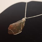 A completely one-of-a-kind handmade gemstone pendant