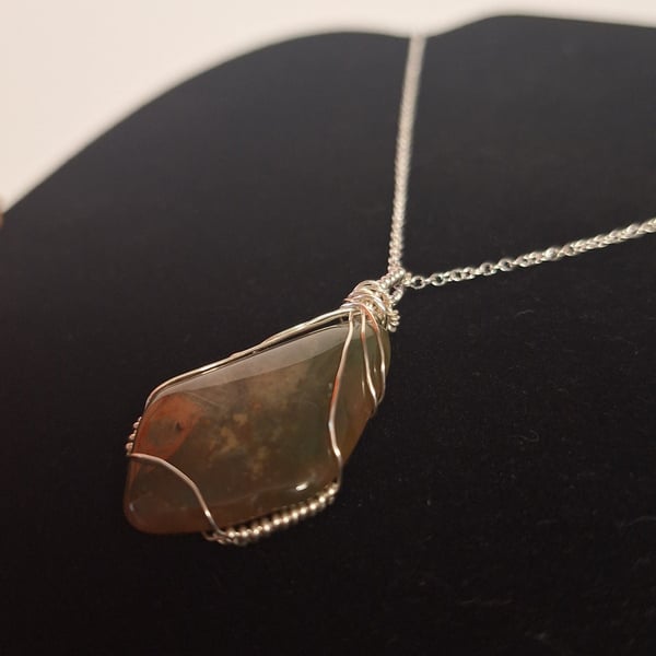 A completely one-of-a-kind handmade gemstone pendant