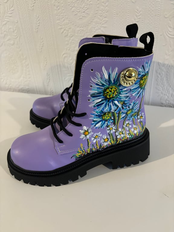 A pair of hand painted and sealed boots by Andrew Jenkins 