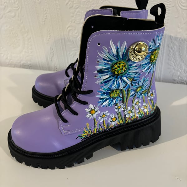 A pair of hand painted and sealed boots by Andrew Jenkins 