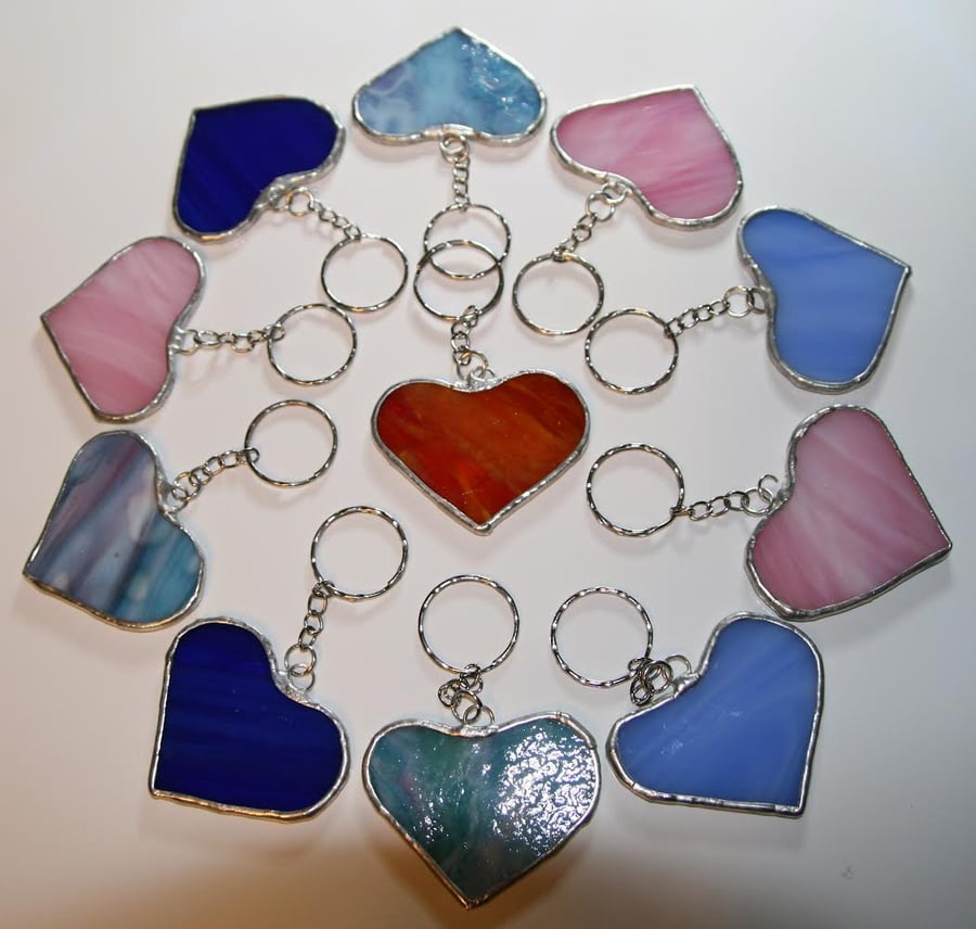 Handmade heart bag charms or keyrings using unique stained glass patterns.