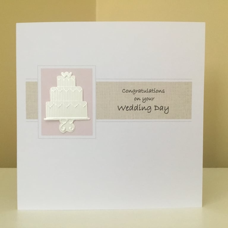 Handmade pearlised and embossed wedding cake card