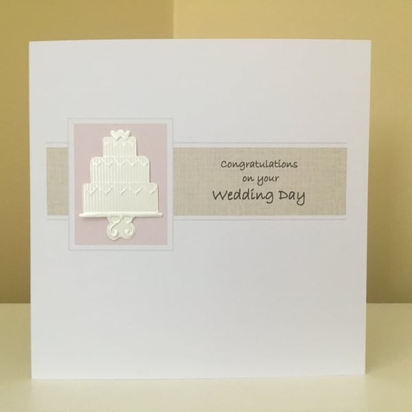 Handmade pearlised and embossed wedding cake card