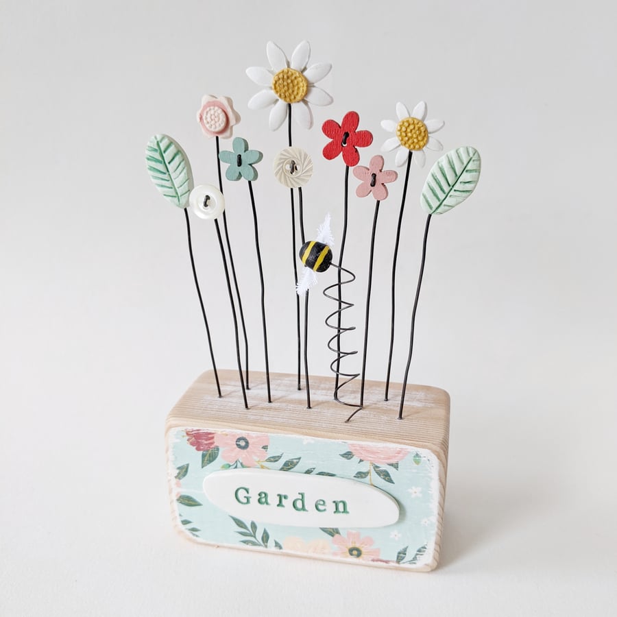 Clay and Button Flower Garden in a Decoupaged Wood Block  'Garden'