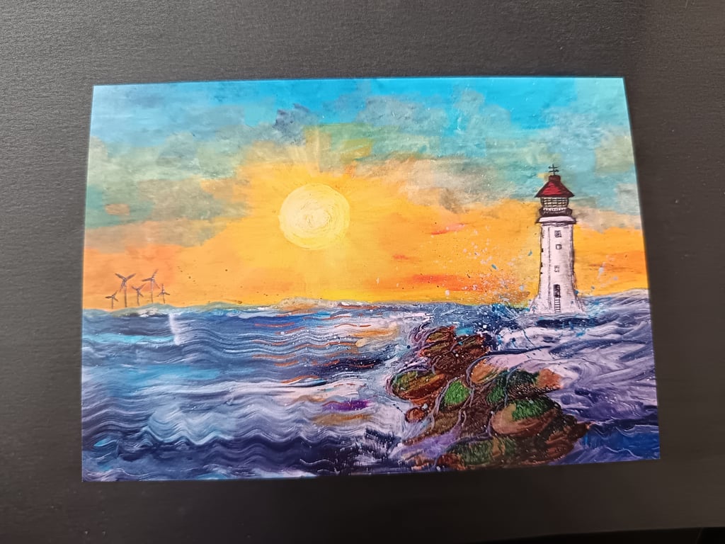 A6 coastal greetings card of lighthouse and sunset at New Brighton beach 