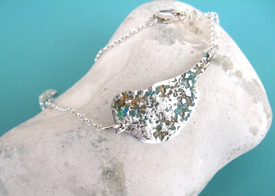 Fine silver bird necklace with copper verdigris patina 