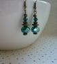 GREEN & ANTIQUE BRONZE DANGLE EARRINGS.  1035 - Image 3