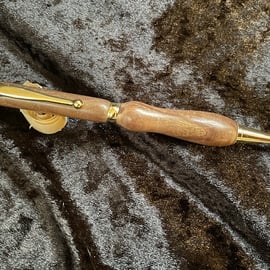 Handturned ball pen with gold plated trims