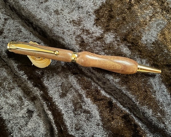 Handturned ball pen with gold plated trims