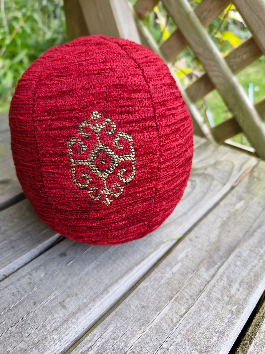 Medium, decorative, christmas, red and gold fabric bauble ball.