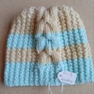 Hand knitted baby hat. Approx 0 to 3 months. Price includes P and P. 