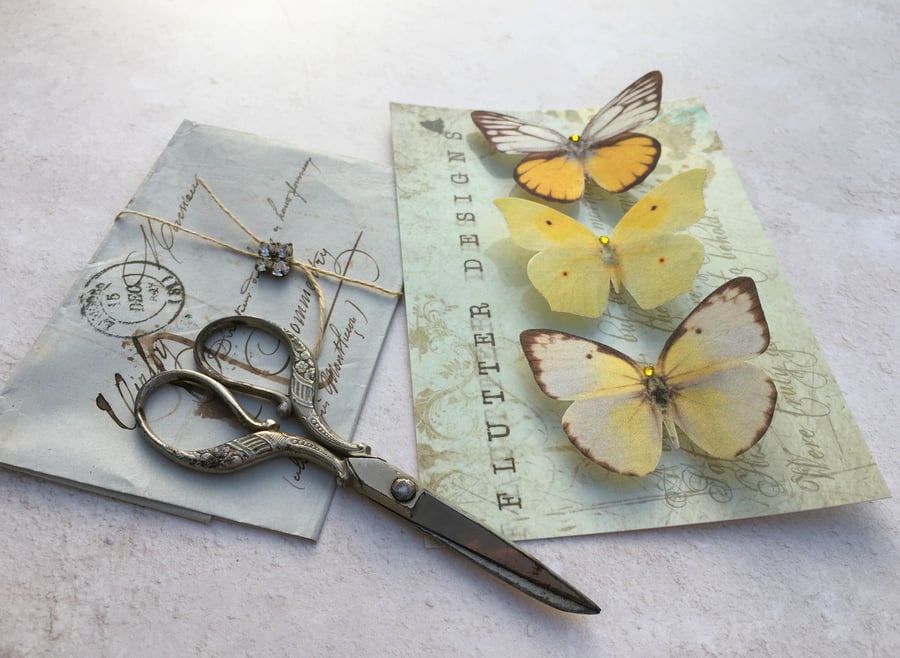Trio of beautiful yellow silk butterfly hair clips with Swarovski Crystals.