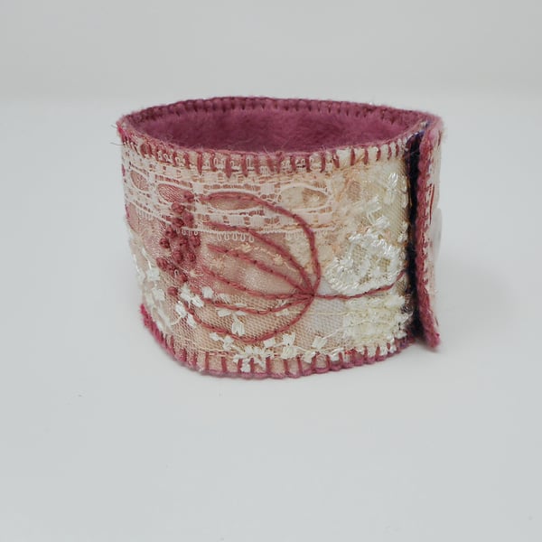 Delicate hand embroidered fabric cuff