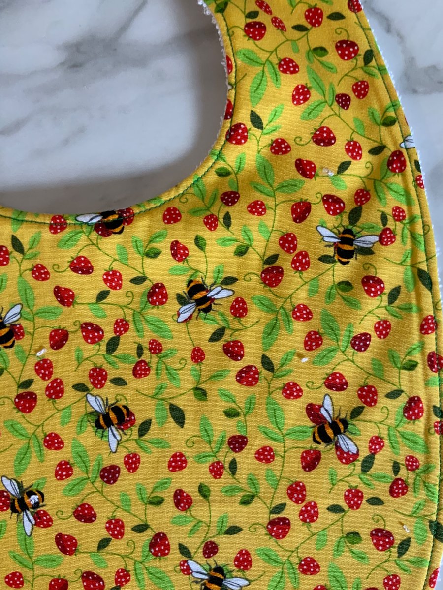 Image of Bib with bumble bees and strawberries - toddler size