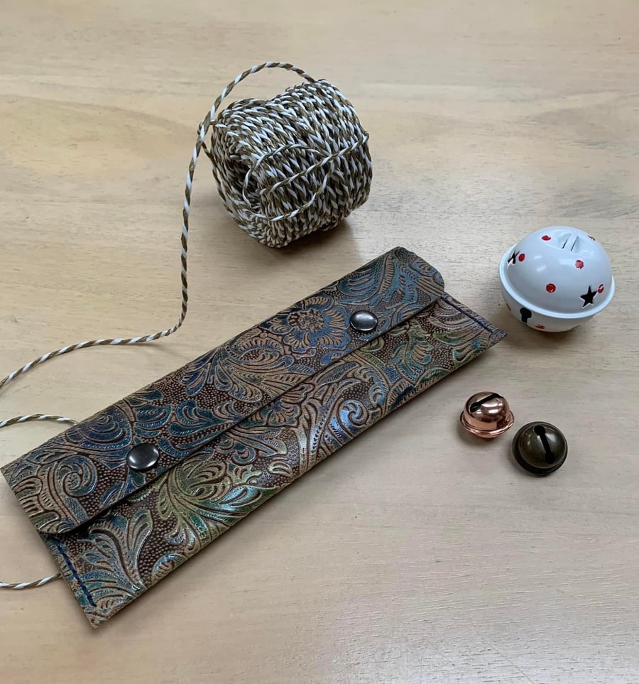 Multi purpose handmade embossed leather unisex pouch