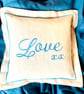 LOVE is BLUE Embroidered Keepsake linen cushion.