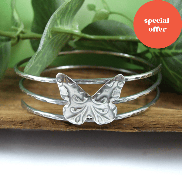 Sterling Silver Wide Open Spiral Bangle with Butterfly. 