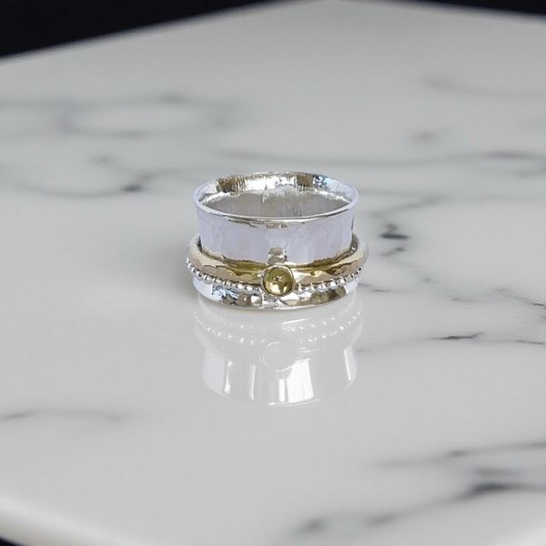 Silver And Gold Peridot Motion Ring