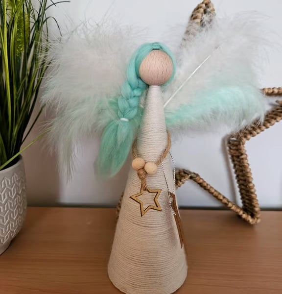 Tree topper angel, green and white wings and green hair