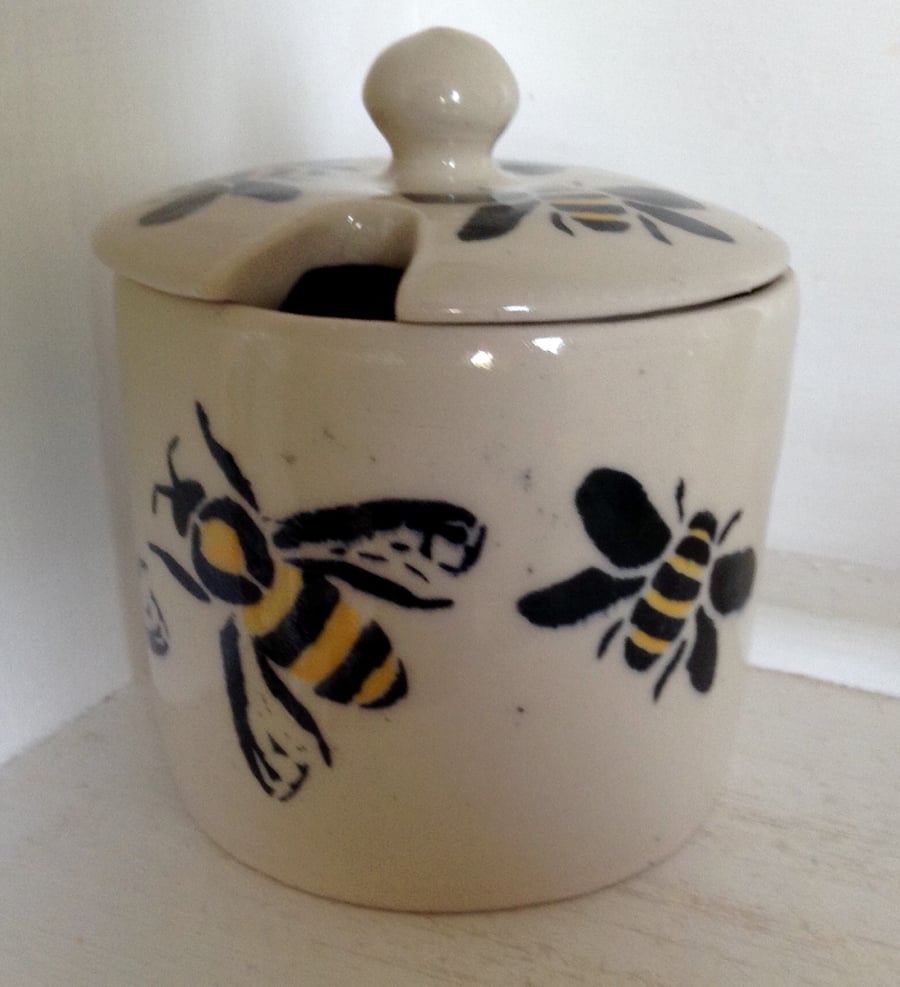 Honey pot or jam pot with lid and spoon