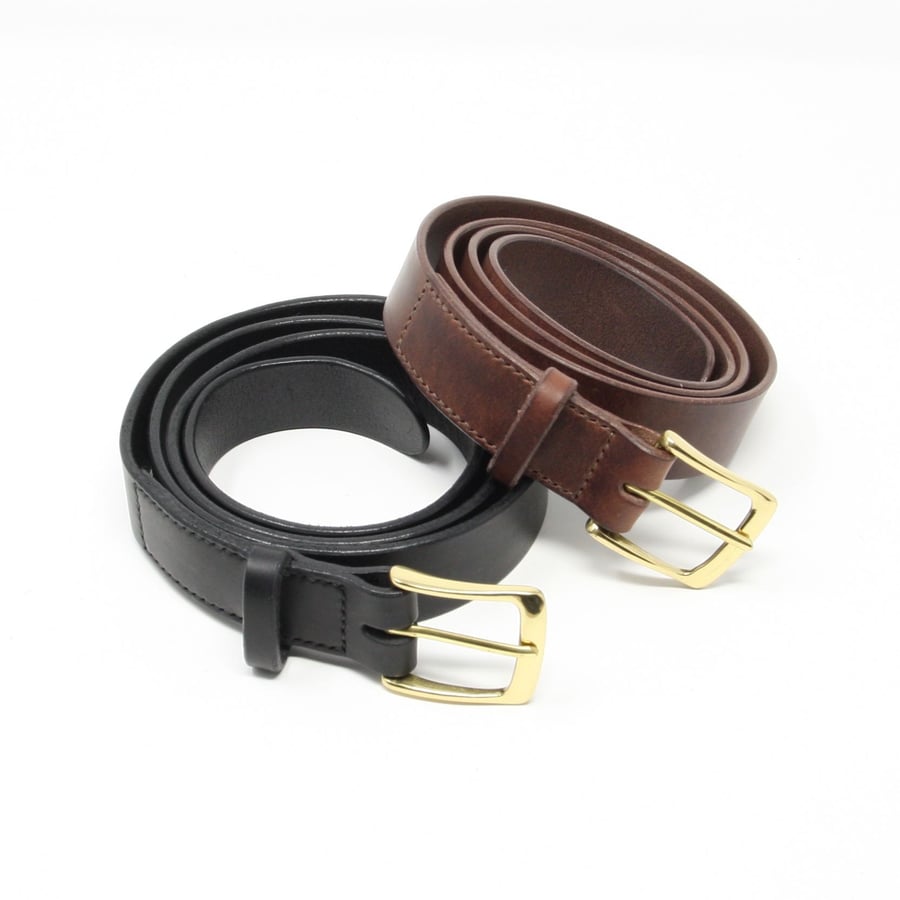 1.25" leather belt with brass buckle; choice of black or brown leather