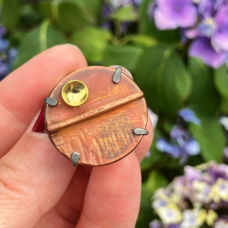 Patinated copper, brass and oxidised silver brooch. 